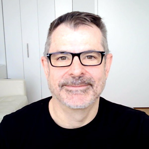 Headshot of Conrad, president of e9digital
